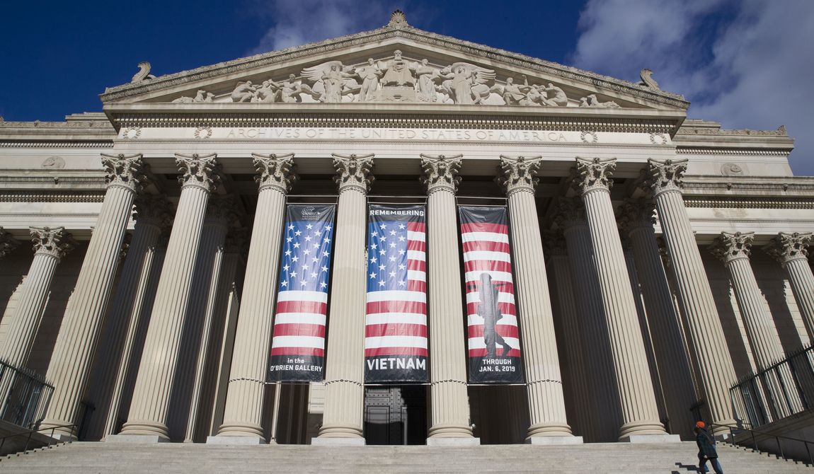 People walk up the steps at the National Archives on Dec. 22, 2018, in Washington. The building was closed that day because of a government shutdown. (AP Photo/Alex Brandon, File)